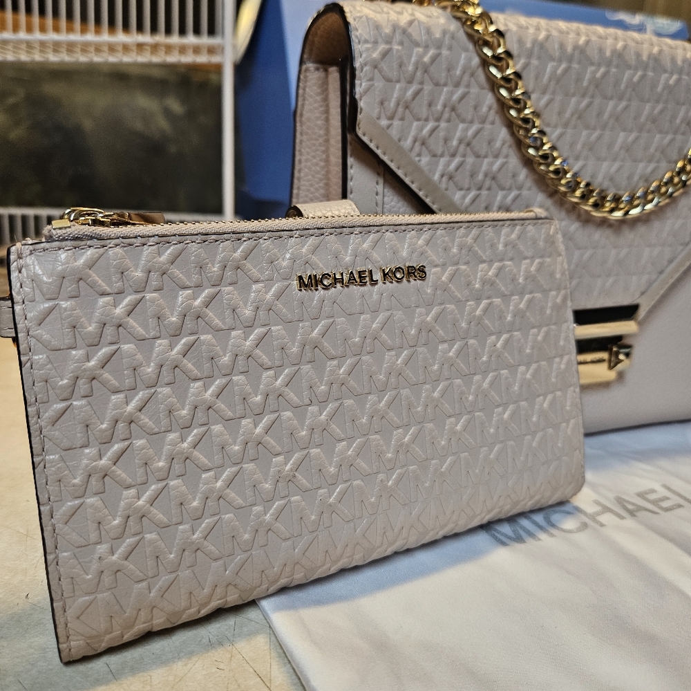 Soft pink Michael Kors large wallet